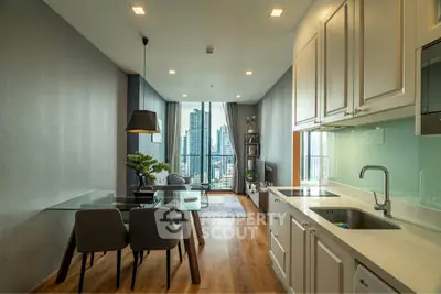 Modern open-plan kitchen and living room with city view