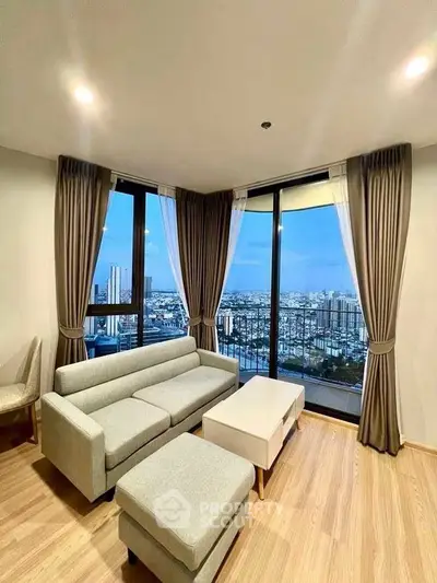 Modern living room with panoramic city view and stylish furniture