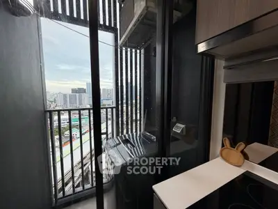 Modern apartment balcony with washing machine and city view