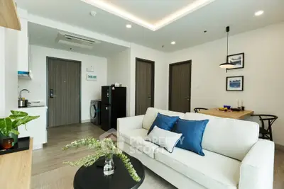 Modern living room with stylish decor and open layout in a contemporary apartment.