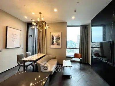 Modern living room with elegant decor and city view, featuring stylish furniture and contemporary lighting.