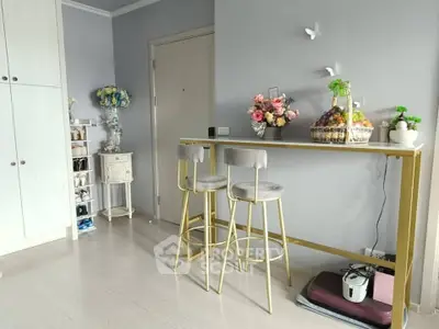 Chic modern interior with stylish bar stools and elegant decor in a cozy living space.