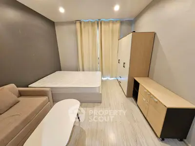 Modern bedroom with minimalist furniture and natural light