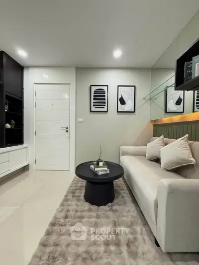 Modern living room with stylish decor and cozy seating area