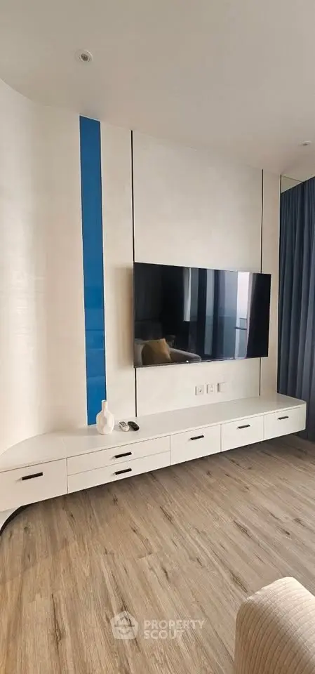 Modern living room with sleek TV setup and stylish decor