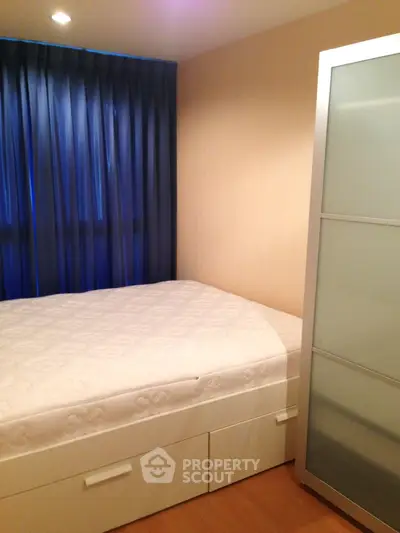 Cozy bedroom with modern design and ample storage space