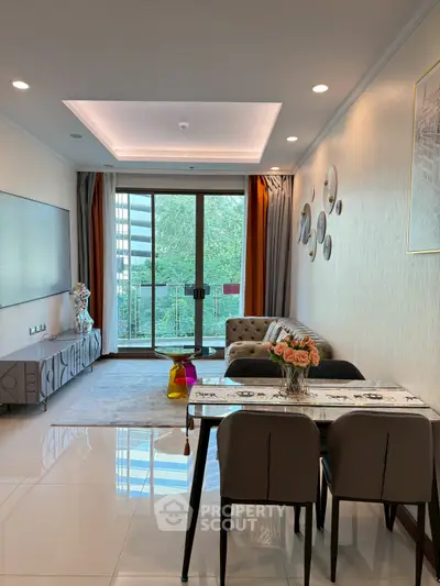 Modern living room with elegant decor and balcony view