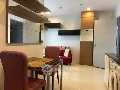 Modern apartment interior with stylish dining area and cozy living room
