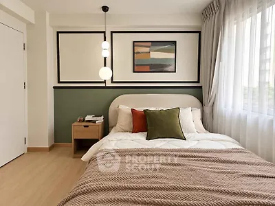 Modern bedroom with stylish decor, featuring a cozy bed, elegant lighting, and a large window for natural light.