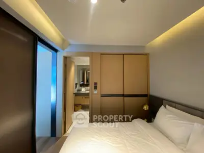 Modern bedroom with sleek design and cozy ambiance