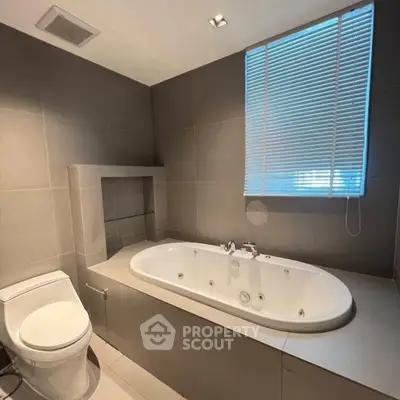 Modern bathroom with sleek bathtub and contemporary design