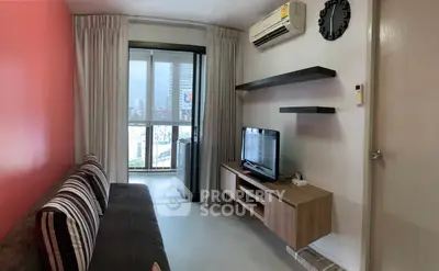 Cozy living room with modern decor and city view from balcony