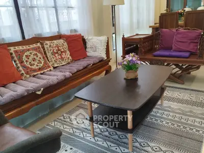 Charming living room with cozy seating and elegant decor