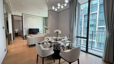 Modern living room with dining area and balcony view in luxury apartment