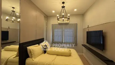 Luxurious bedroom with elegant lighting and modern TV setup