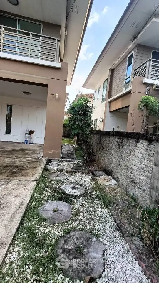 Modern residential property with spacious driveway and garden area