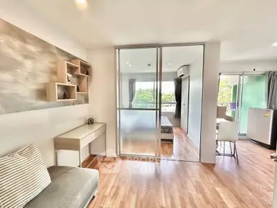 Modern open-plan living room with stylish decor and natural light