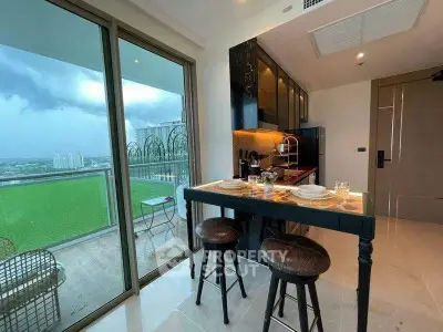 Modern kitchen with open layout and stunning balcony view in luxury apartment
