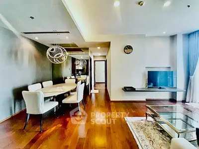 Luxurious modern living room with elegant dining area and hardwood floors