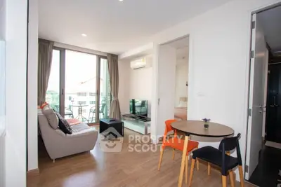 Modern living room with balcony view in stylish apartment