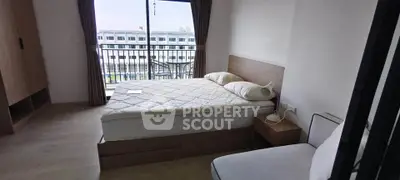 Modern bedroom with balcony view in a stylish apartment