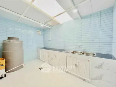Modern kitchen with sleek design and ample storage space