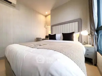 Cozy modern bedroom with stylish decor and natural light