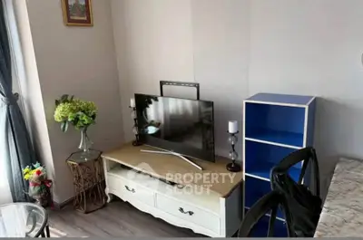 Charming living room corner with stylish TV stand and elegant decor