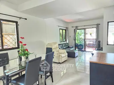 Spacious living room with modern furniture and natural light