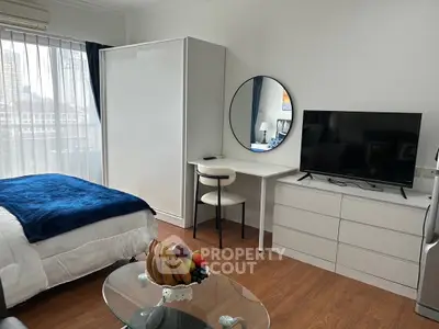 Modern studio apartment with stylish furniture and natural light