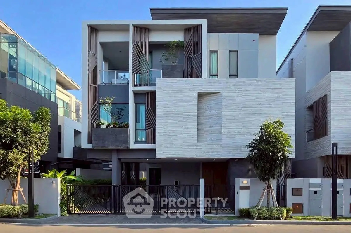 Modern architectural masterpiece with sleek design and lush greenery, perfect for luxury living.