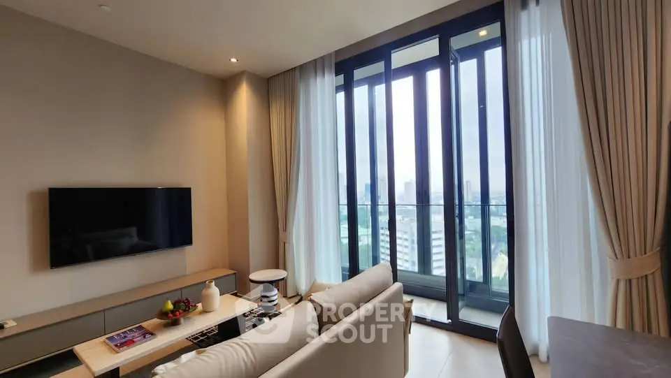 Luxurious living room with floor-to-ceiling windows and city view