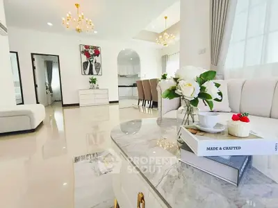 Luxurious open-plan living room with elegant decor and modern furnishings, perfect for stylish living.