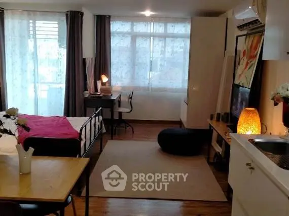 Cozy studio apartment with modern decor and natural light