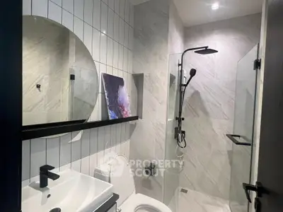 Modern bathroom with sleek fixtures and stylish shower design