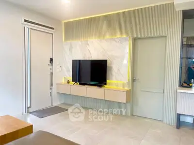 Modern living room with sleek TV setup and stylish decor