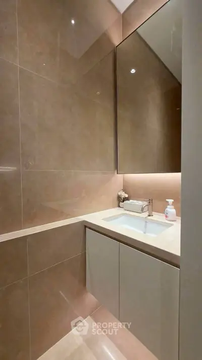 Elegant modern bathroom with sleek design and ambient lighting