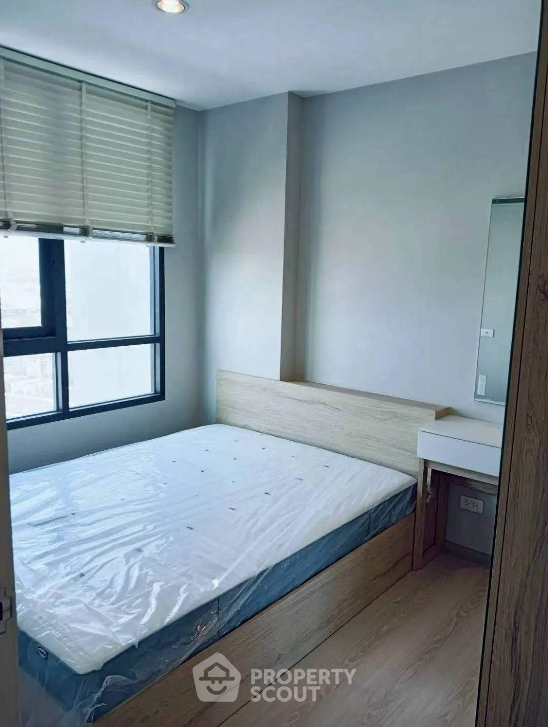 Modern bedroom with natural light and minimalist design