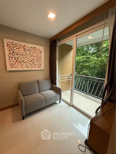 Cozy living room with balcony view and modern decor