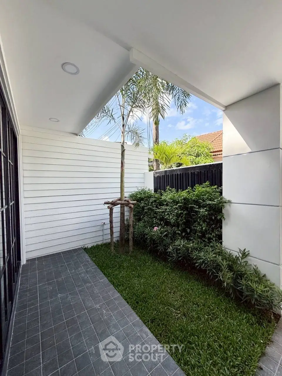 Charming garden area with modern design and lush greenery