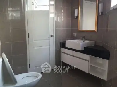 Modern bathroom with sleek fixtures and elegant tile design
