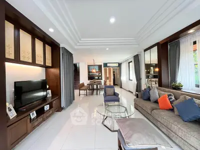 Spacious modern living room with elegant decor and natural light