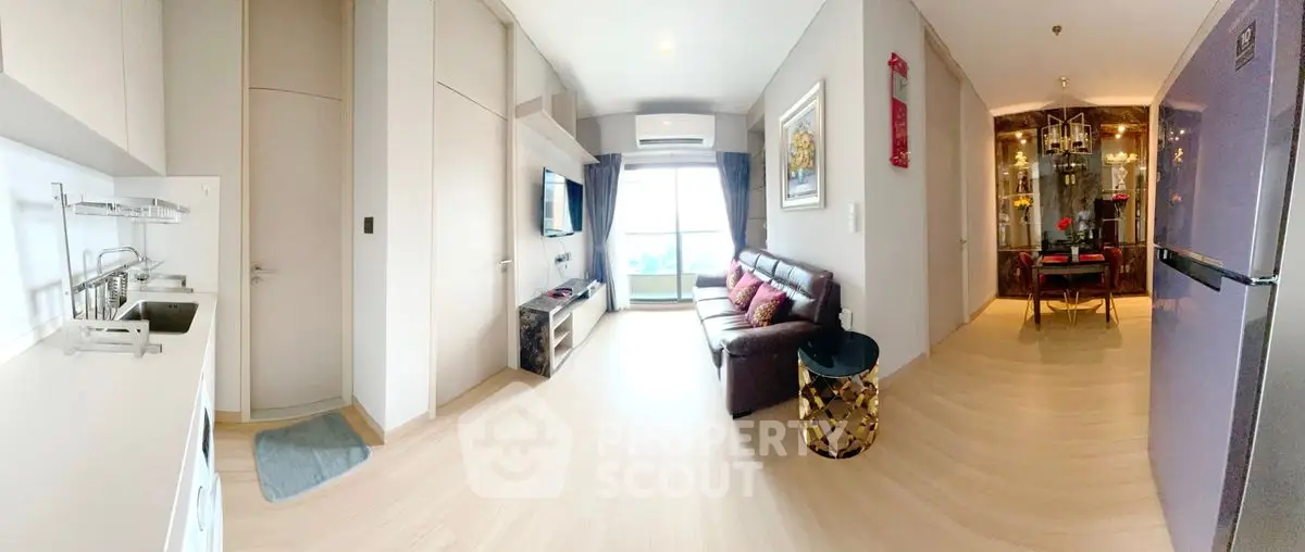 Spacious modern living room with open kitchen and elegant dining area