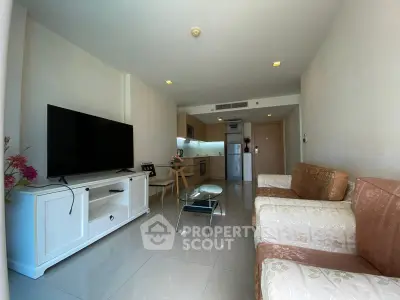 Spacious modern living room with open kitchen in a stylish apartment