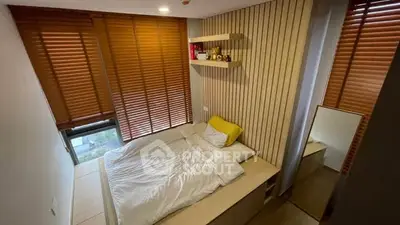 Cozy modern bedroom with wooden blinds and minimalist decor