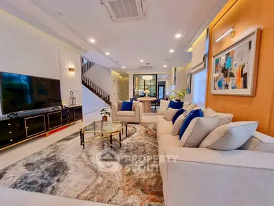 Luxurious living room with modern decor and spacious seating area