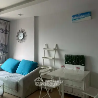 Chic modern living room with stylish decor and cozy seating area.