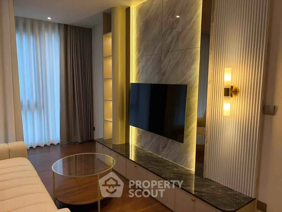Luxurious modern living room with elegant lighting and sleek TV setup