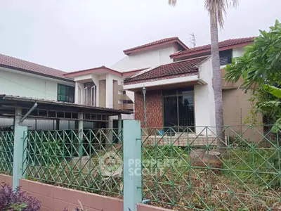 Charming suburban house with lush garden and modern architecture