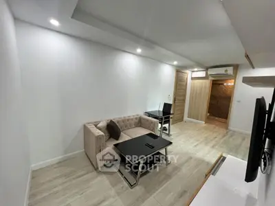 Modern living room with stylish furniture and sleek design, perfect for urban living.